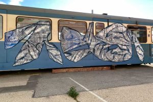 Graffiti writer SKIRL piece